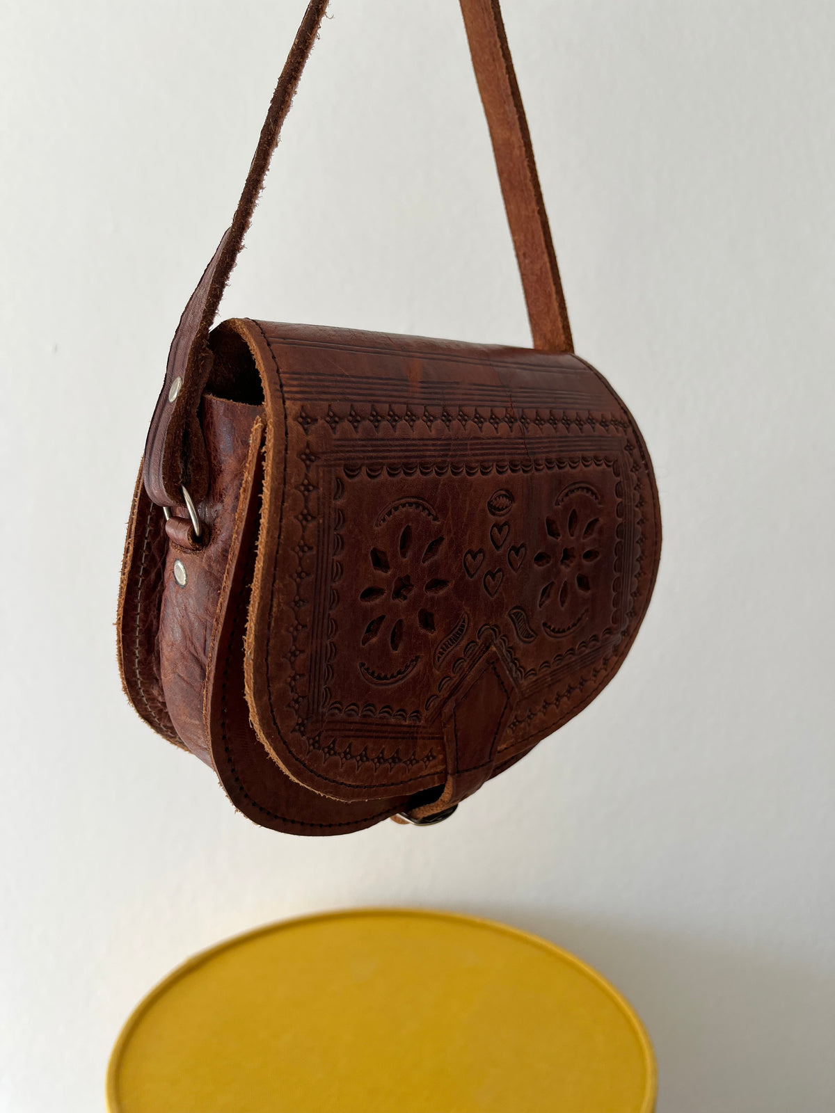 Vintage brown leather tooled crossbody bag
