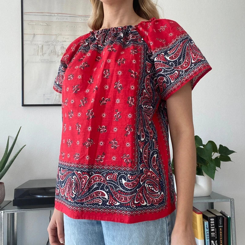 red and white bandana-print off-the-shoulder top