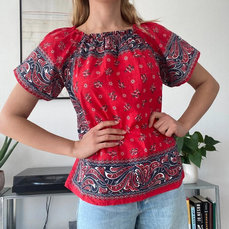 red and white bandana-print off-the-shoulder top