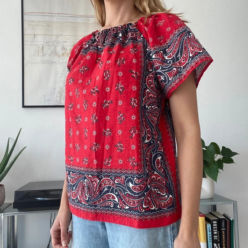 red and white bandana-print off-the-shoulder top
