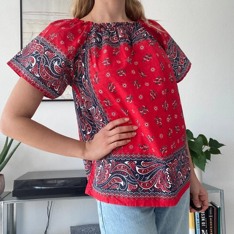 red and white bandana-print off-the-shoulder top