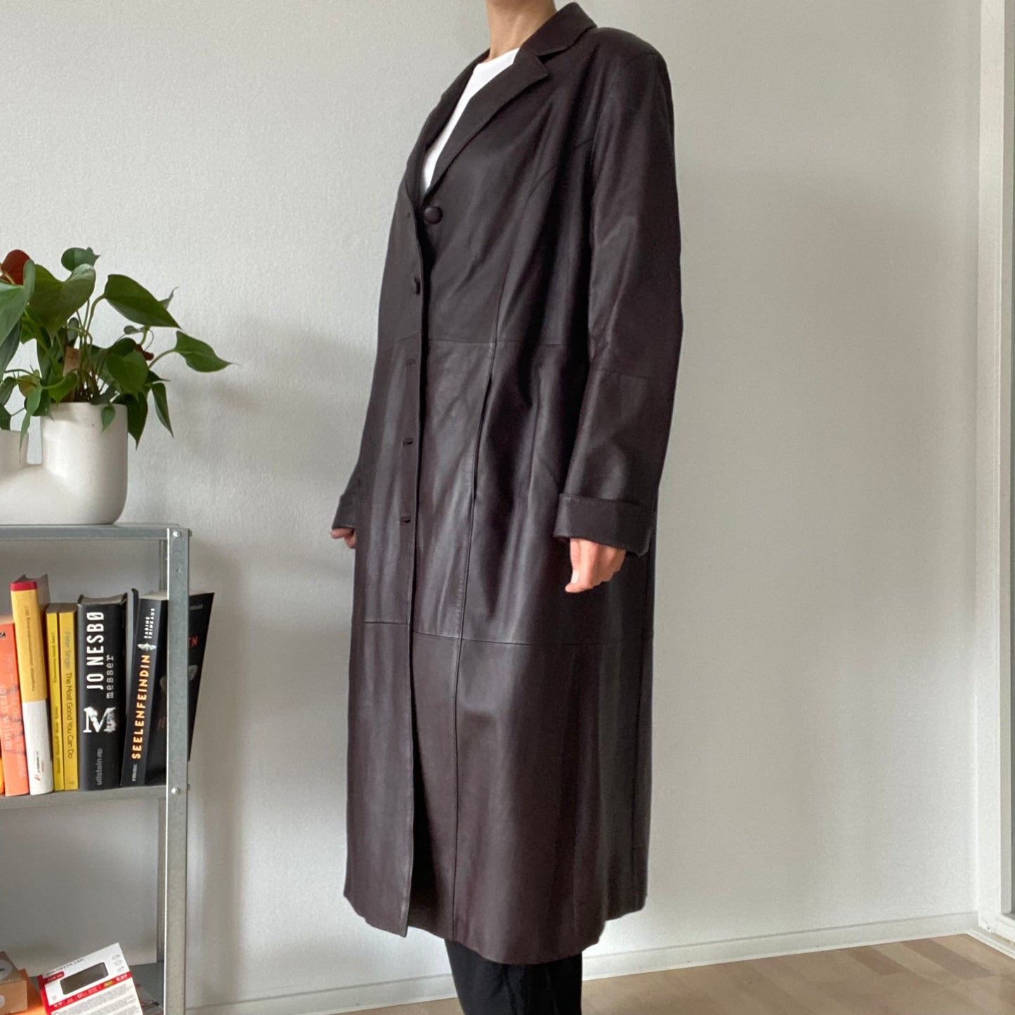 Long brown leather coat