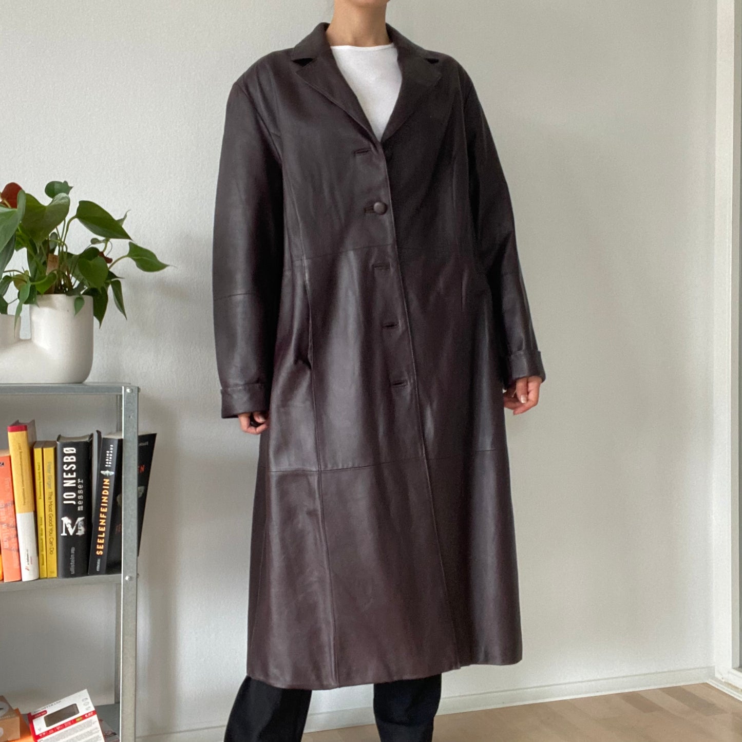 Long brown leather coat