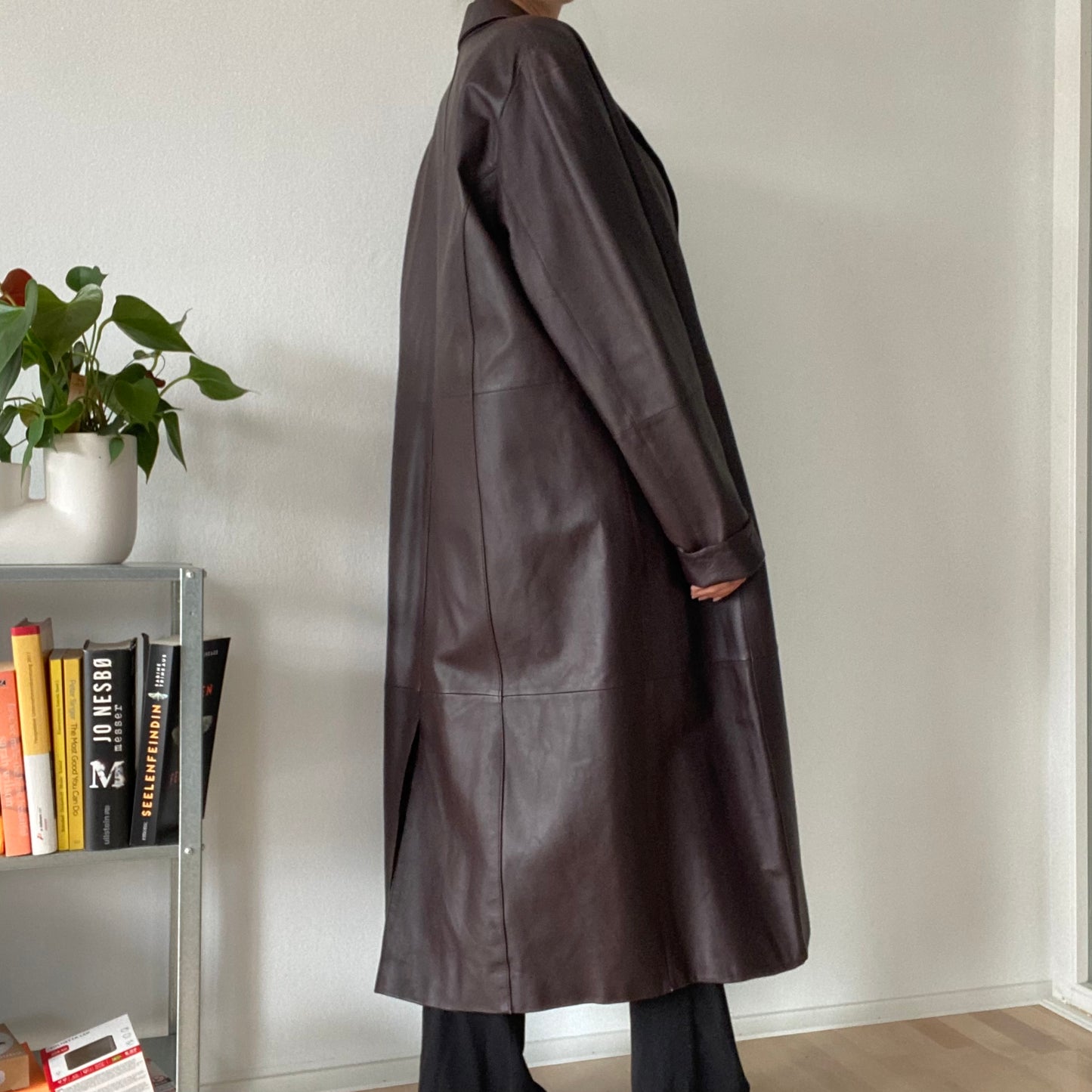 Long brown leather coat