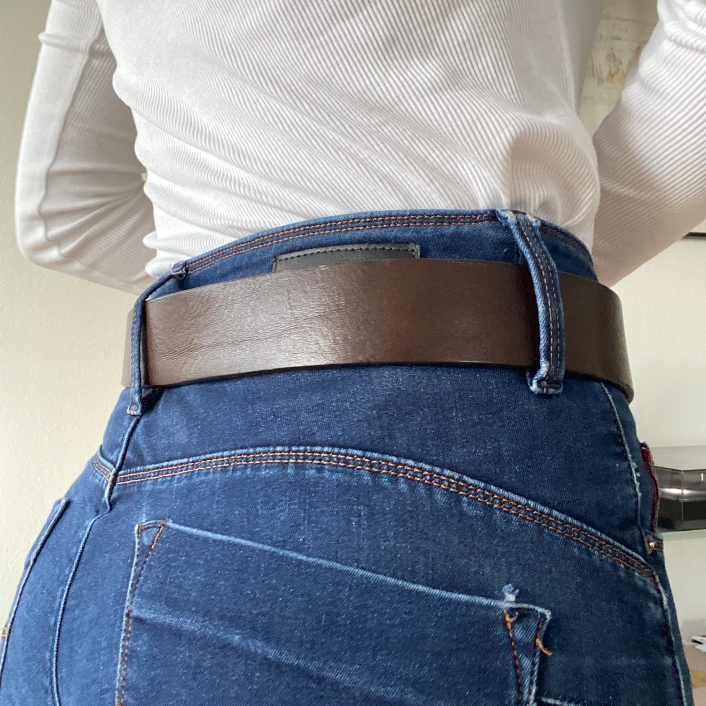 Thick brown metal leather belt