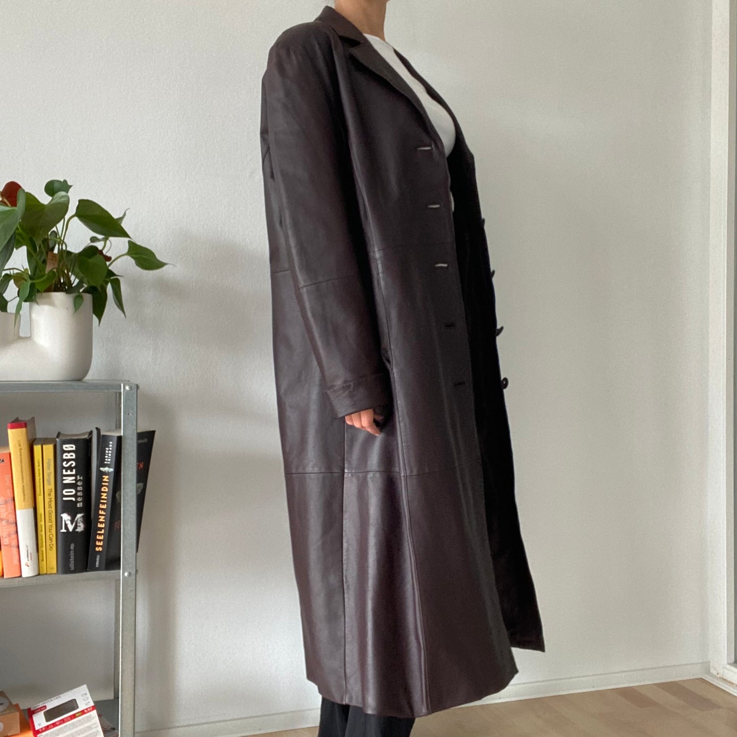 Long brown leather coat