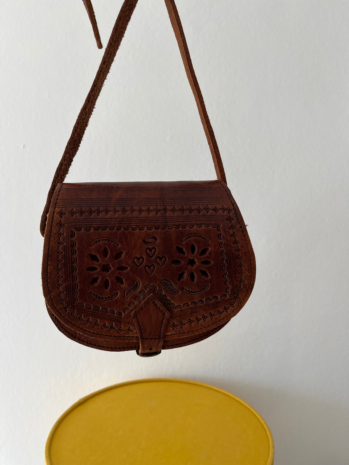 Vintage brown leather tooled crossbody bag