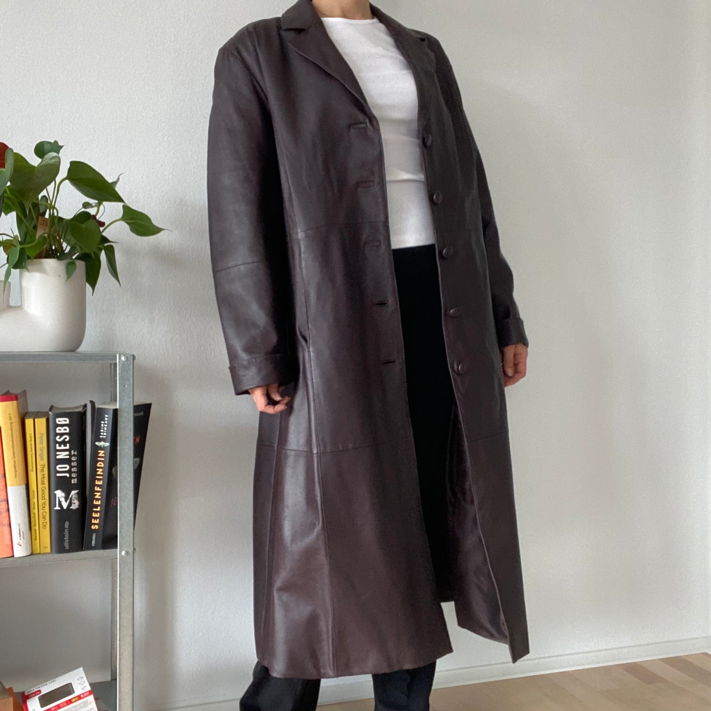 Long brown leather coat