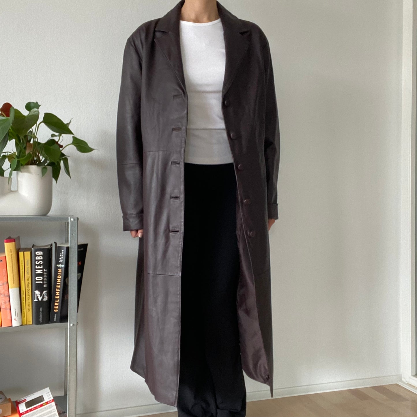 Long brown leather coat