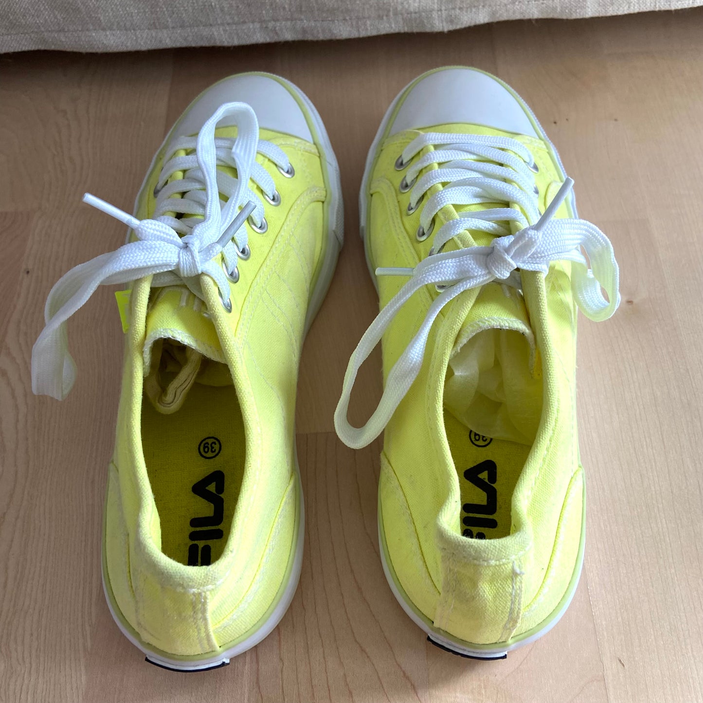 Yellow fila sneakers