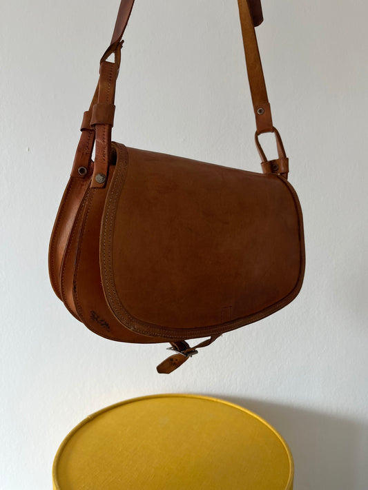 A vintage brown leather saddle