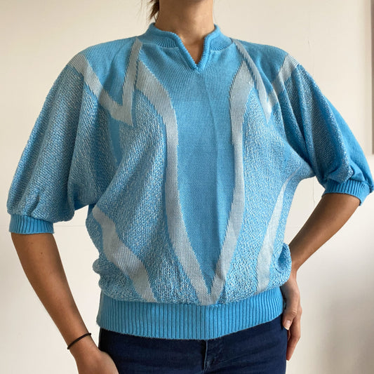 Blue short sleeve pullover sweater.