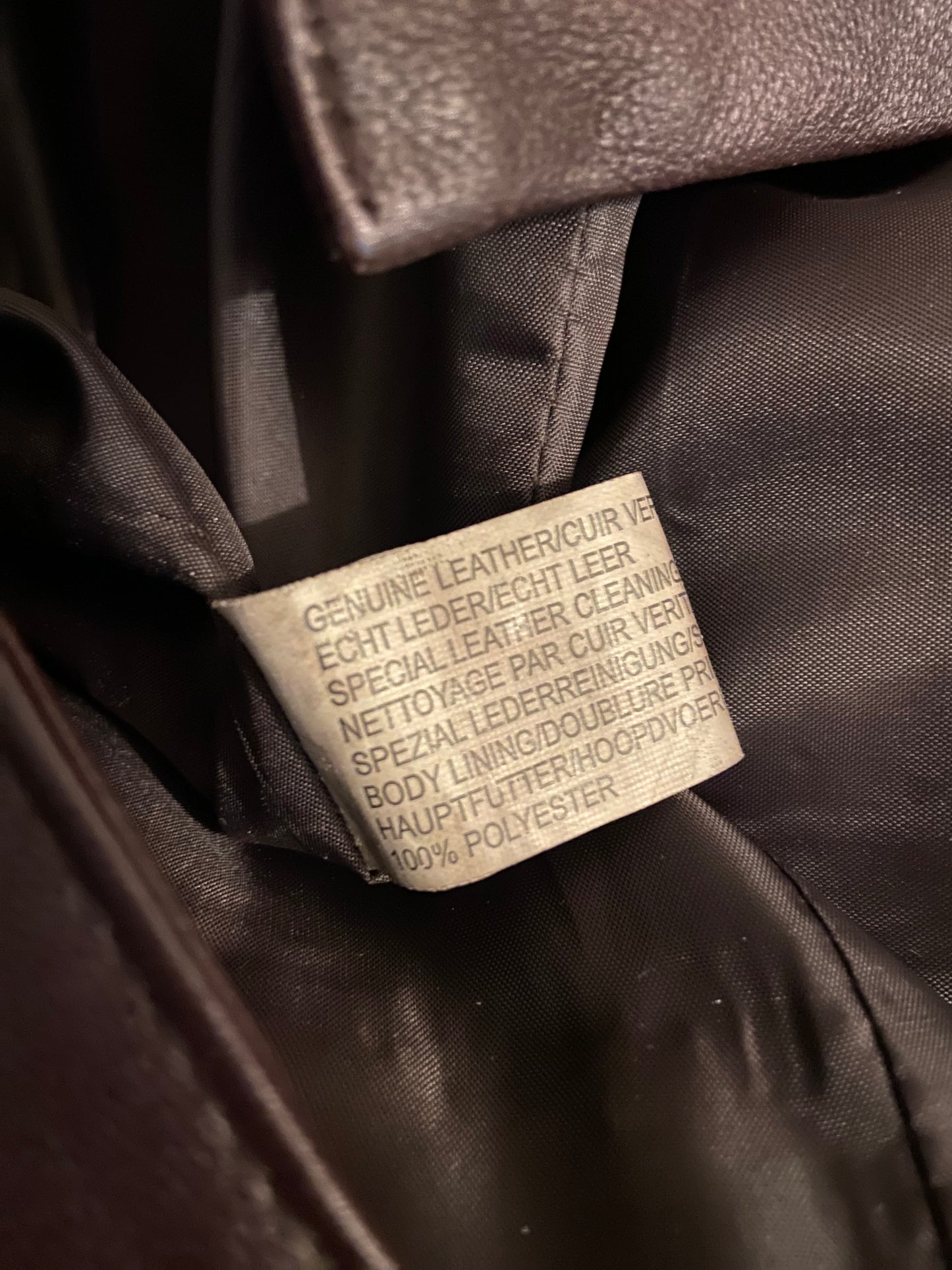 Long brown leather coat