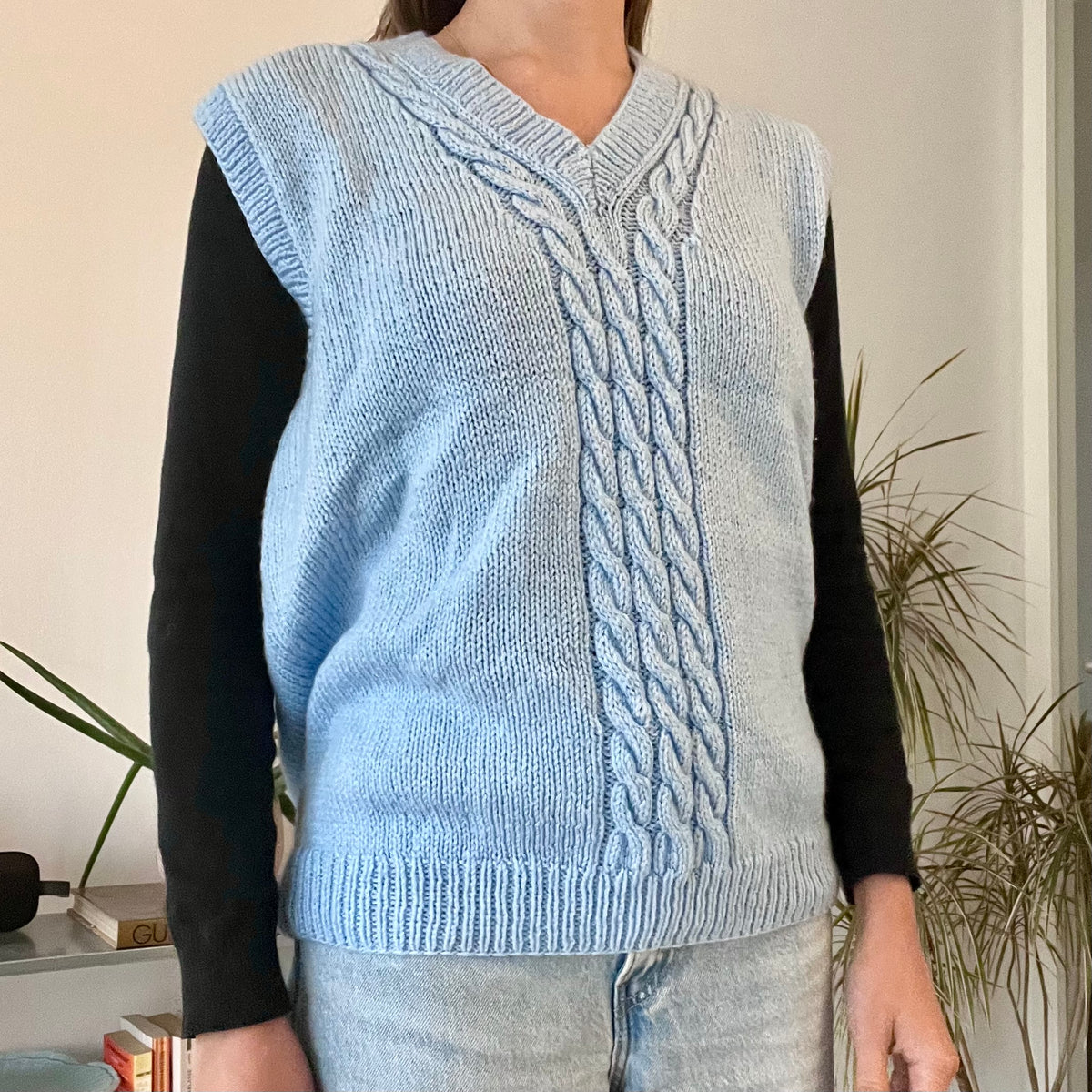 Sleeveless knitted blue vest-size L