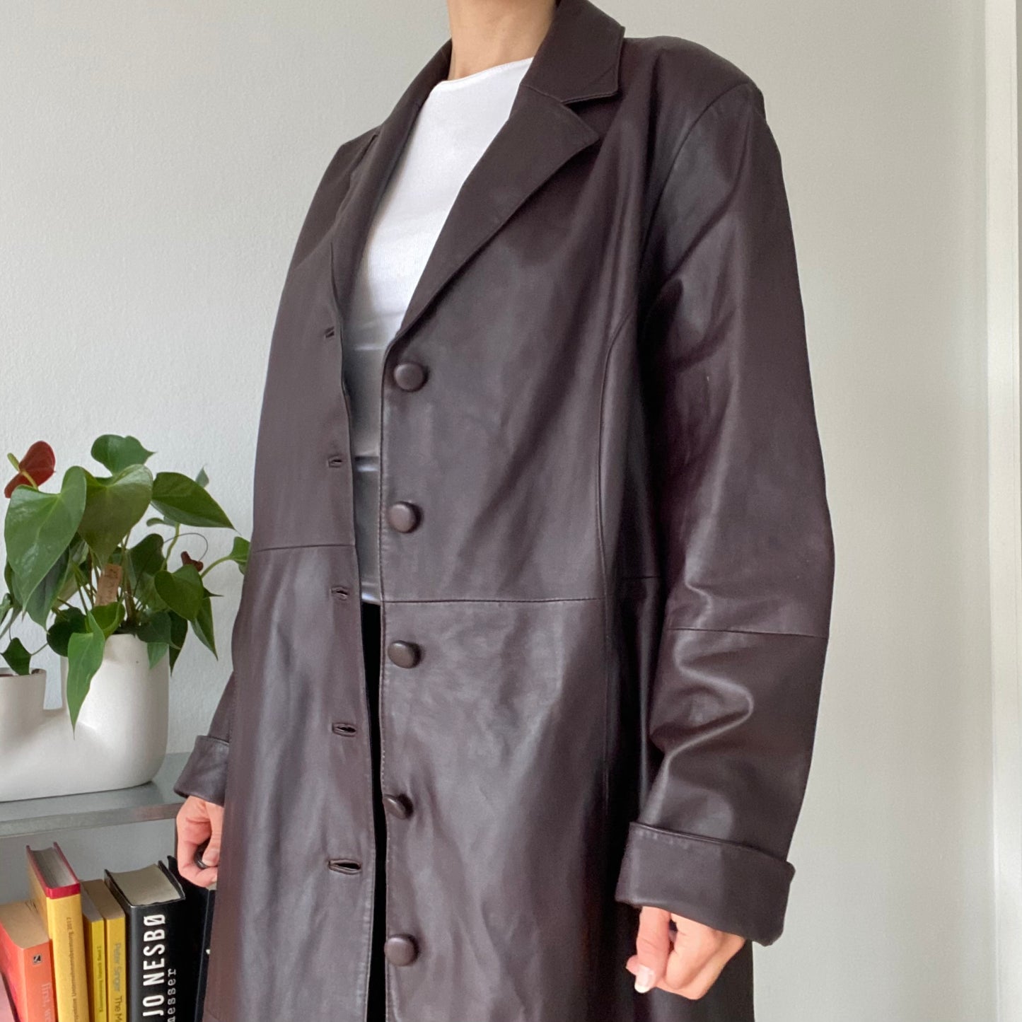 Long brown leather coat