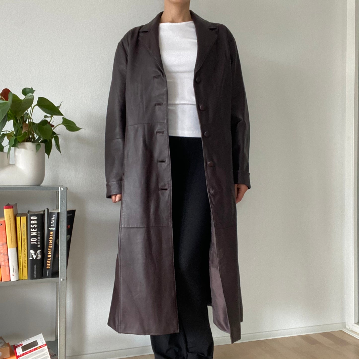 Long brown leather coat