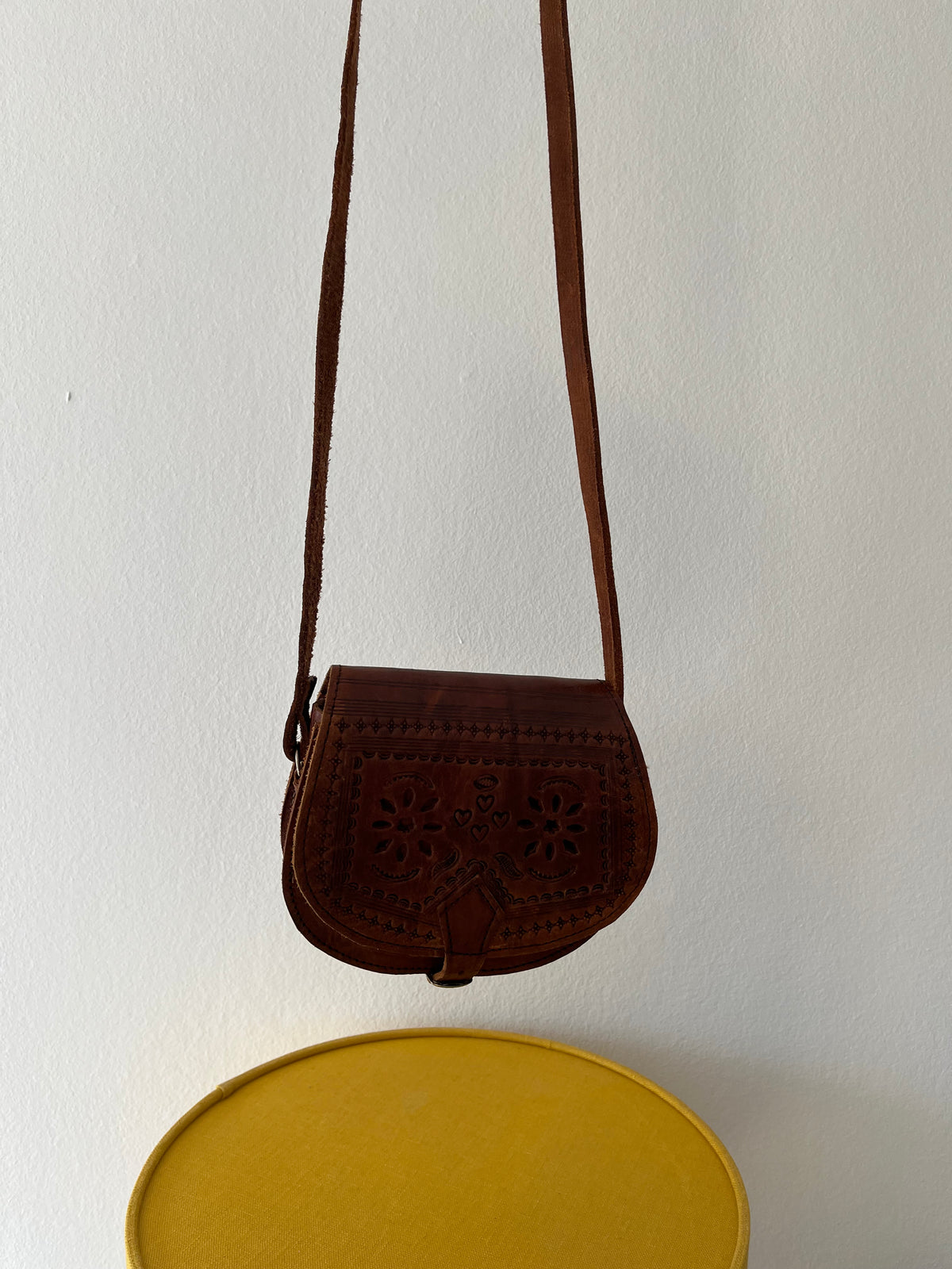 Vintage brown leather tooled crossbody bag