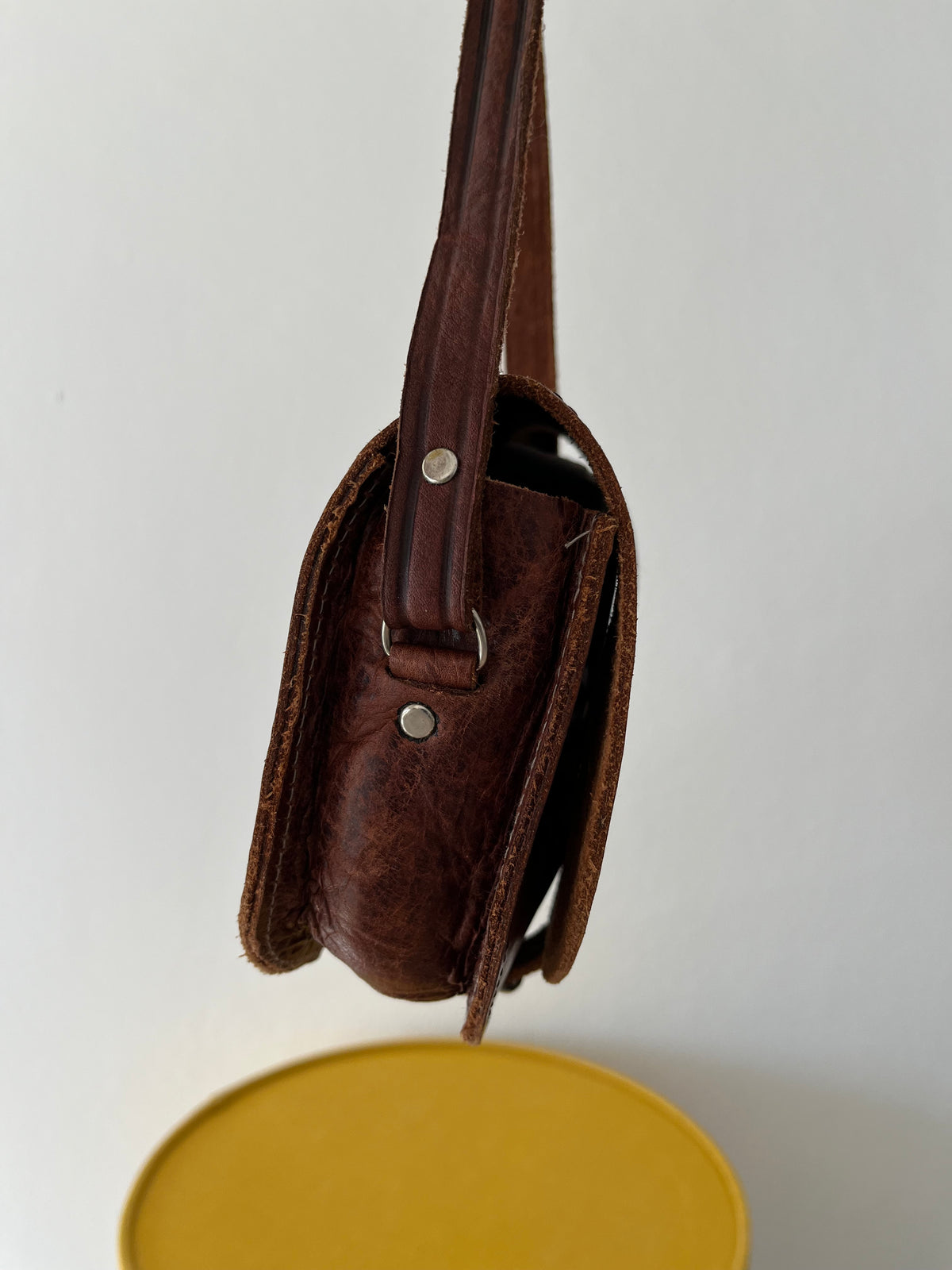 Vintage brown leather tooled crossbody bag