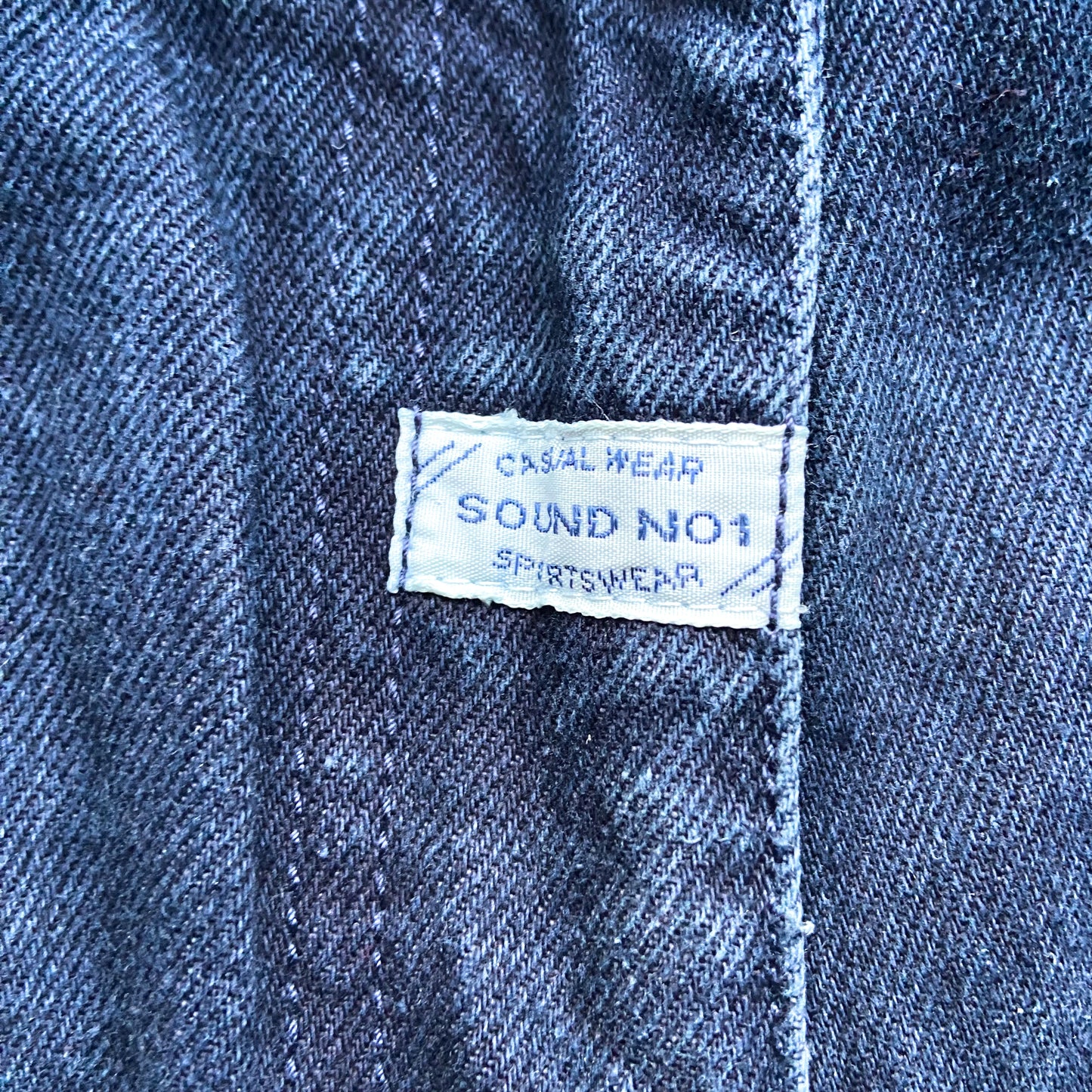 Dark blue trousers