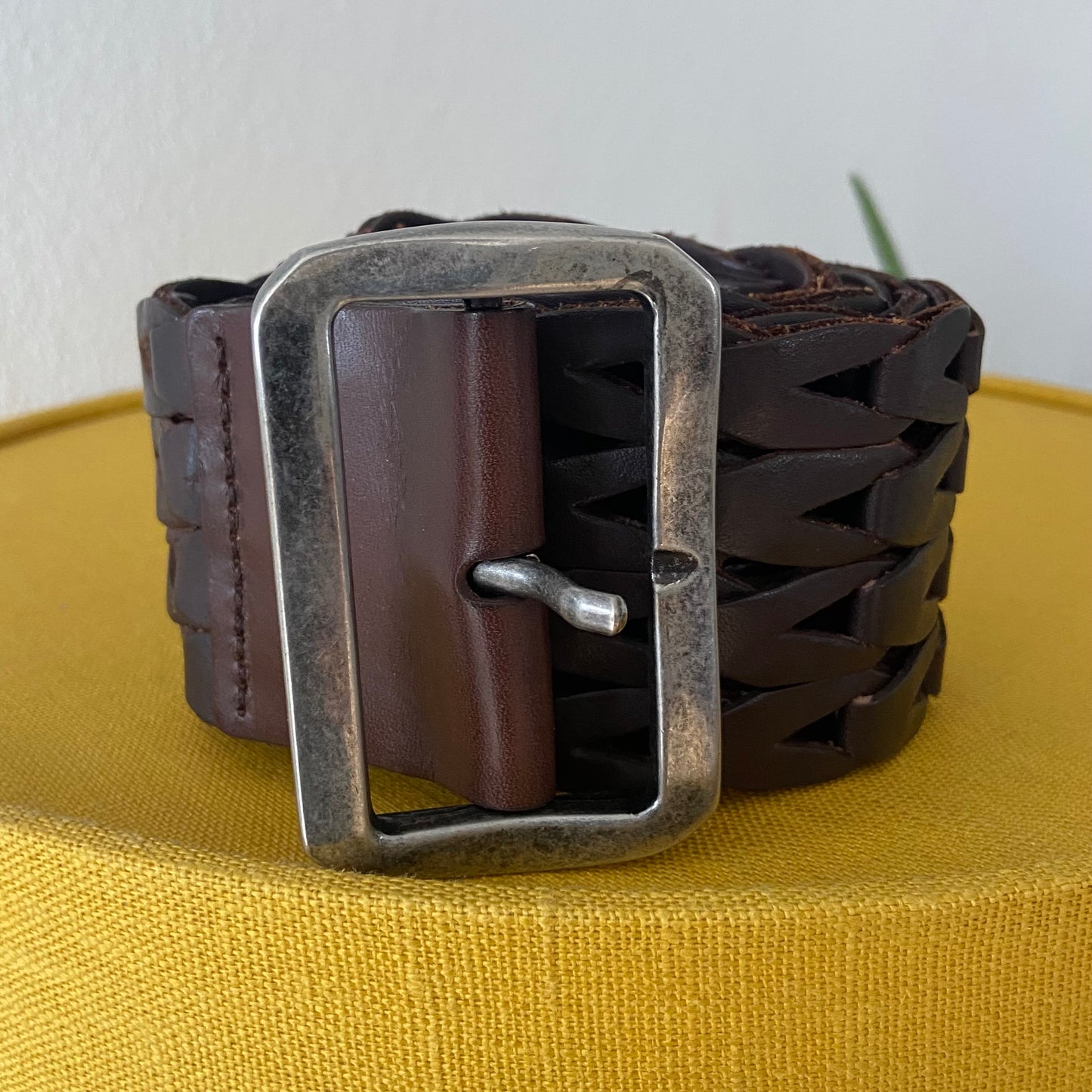 Thick brown braided leather belt